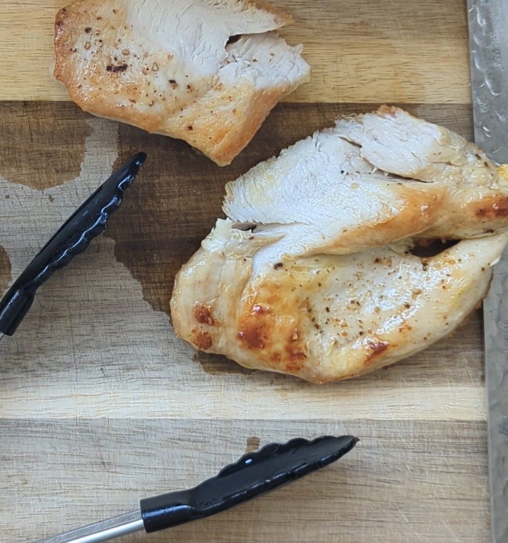 Sliced pan-fried chicken breast