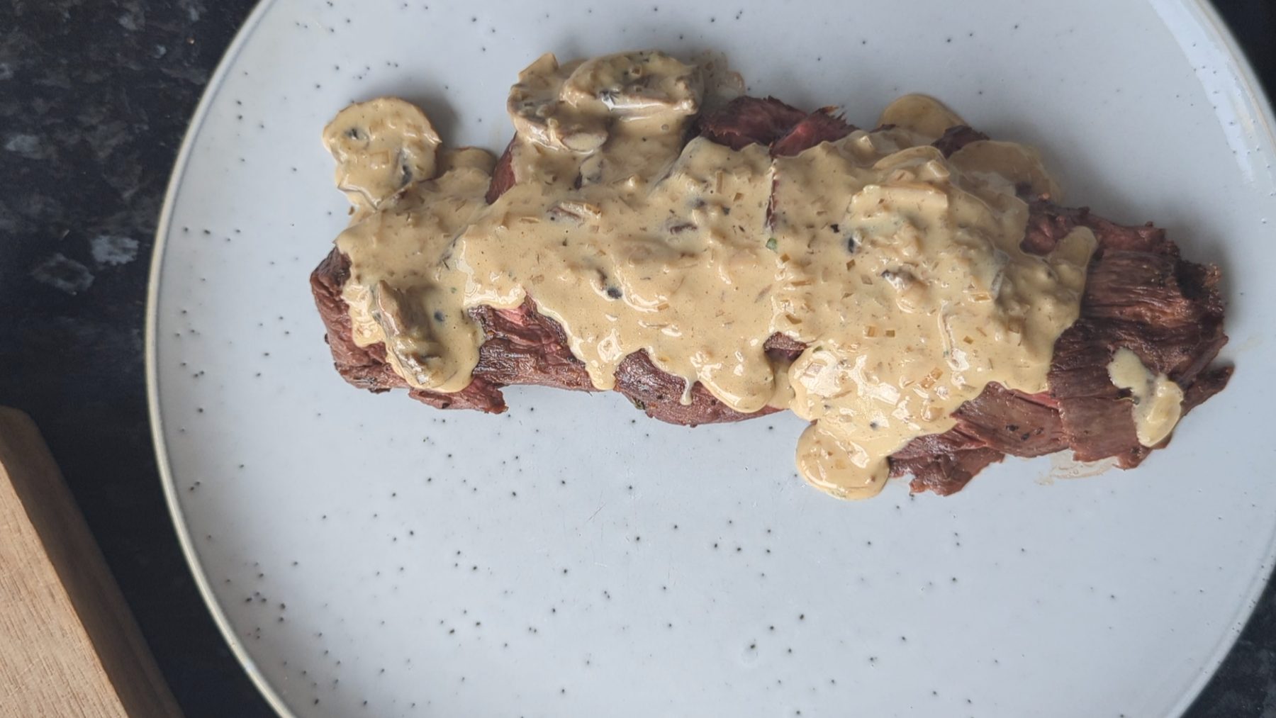 Sliced hanger steak with Diane mushroom pan sauce